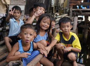 Boat Kids in Bacoor laugh and play together