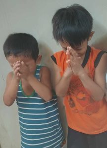 Boys in Mindanao pray to Jesus, knowing he hears them!